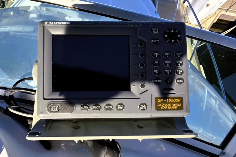 Slide: The Image of Furuno GP-1650DF GPS plotter on 2000 Bayliner 2858 Ciera Command Bridge. - 15