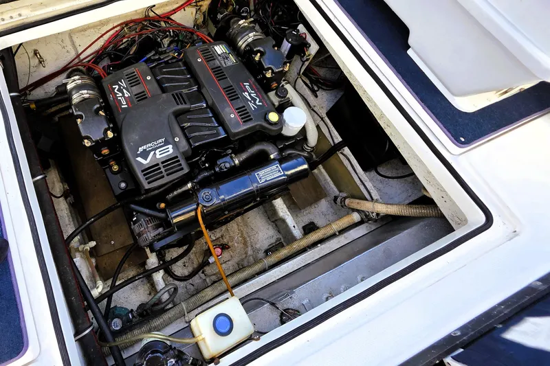 Slide: The Image of Engine compartment of 2000 Bayliner 2858 Ciera Command Bridge with Mercury V8 engine. - 23