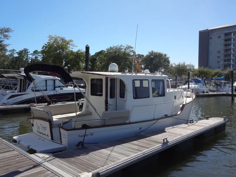 Slide: The Image of 2016 North Aegean 30 boat docked at marina. - 11