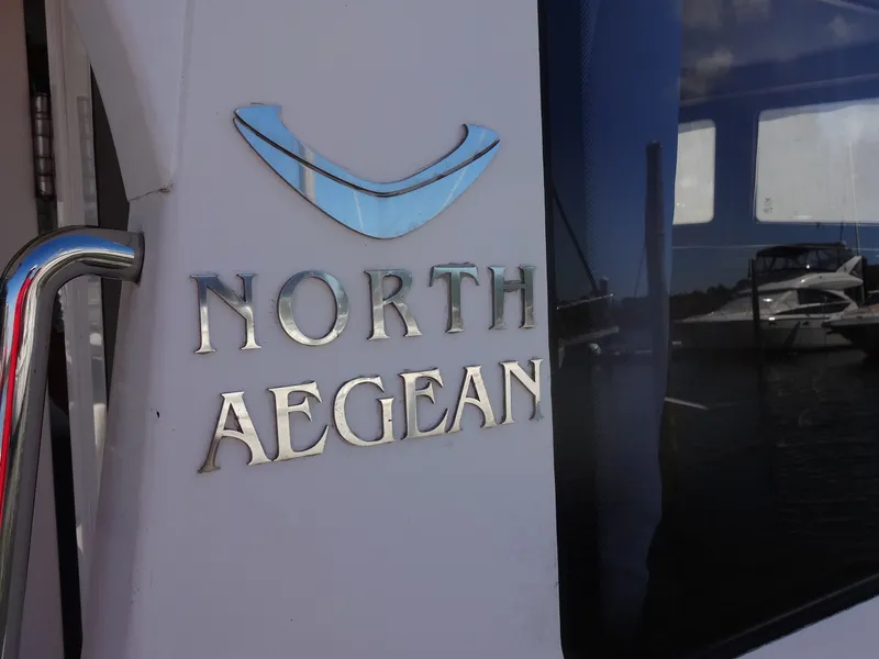 Slide: The Image of Close-up of 2016 North Aegean 30 boat logo. - 14