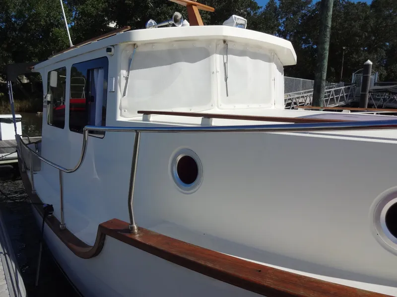 Slide: The Image of North Aegean 30 boat from 2016 docked at marina. - 18