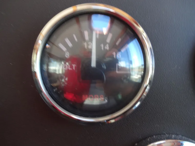 Slide: The Image of Close-up of a voltmeter in a 2016 North Aegean 30 boat. - 26
