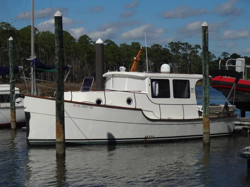 Slide: The Image of 2016 North Aegean 30 boat docked at marina. - 3