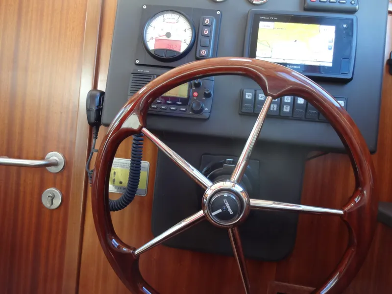 Slide: The Image of Steering wheel and instruments of a 2016 North Aegean 30 yacht. - 31