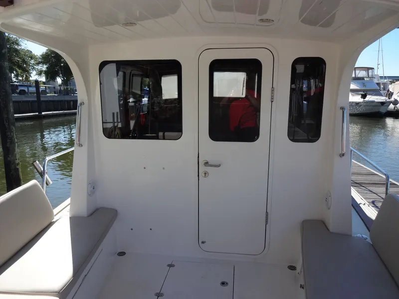 Slide: The Image of Interior of a 2016 North Aegean 30 yacht with seating area. - 32