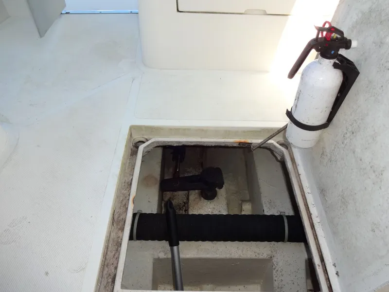 Slide: The Image of Interior of a 2016 North Aegean 30 boat with fire extinguisher. - 35