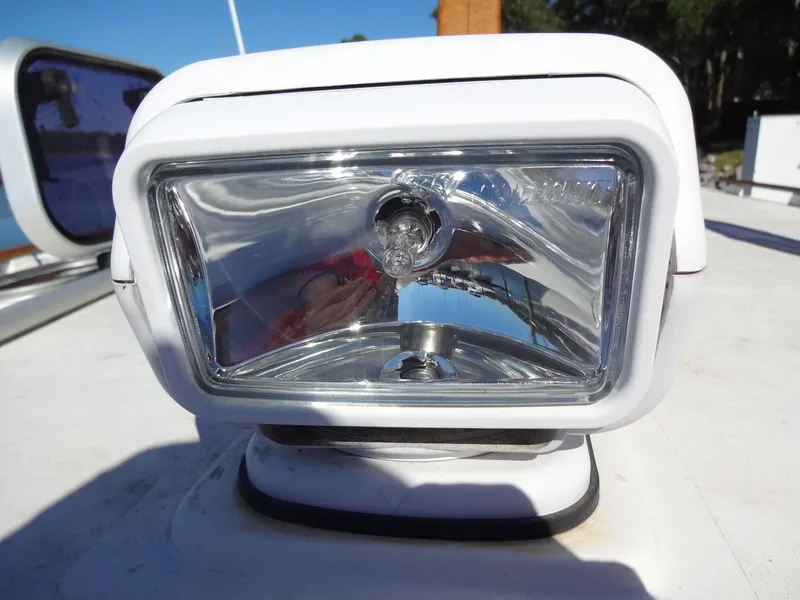 Slide: The Image of Close-up of a spotlight on a 2016 North Aegean 30 boat. - 45