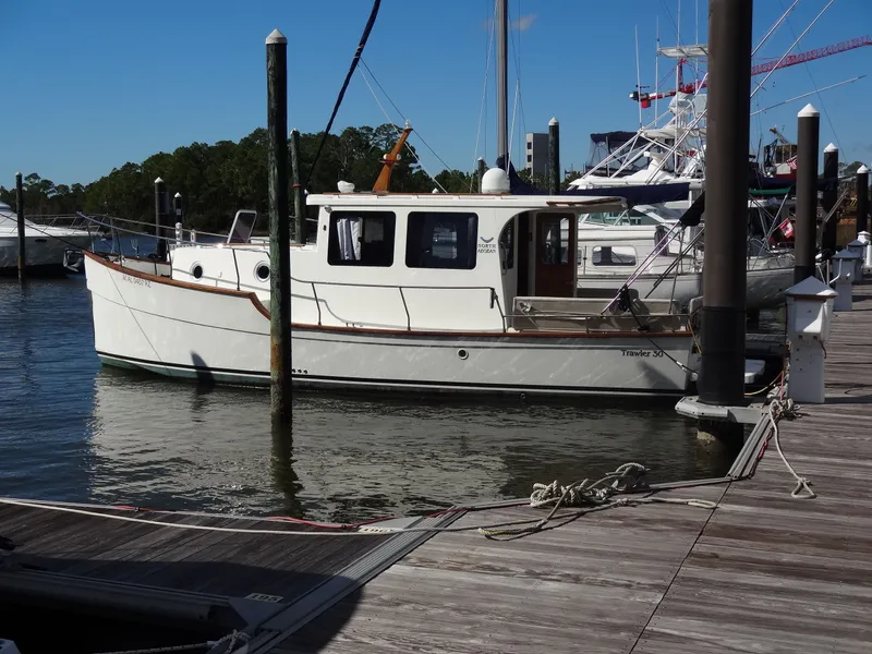 Slide: The Image of 2016 North Aegean 30 Trawler docked at marina. - 5