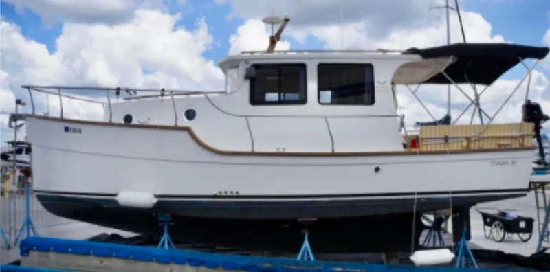 Slide: The Image of 2016 North Aegean 30 boat on a dry dock. - 83