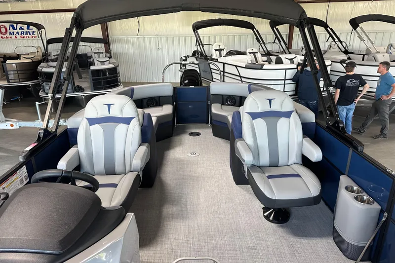 Slide: The Image of 2025 Trifecta 24RFCS3 pontoon boat interior with luxury seating and modern design. - 6