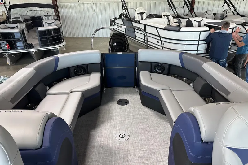 Slide: The Image of 2025 Trifecta 24RFCS3 pontoon boat interior with luxurious seating and modern design. - 9