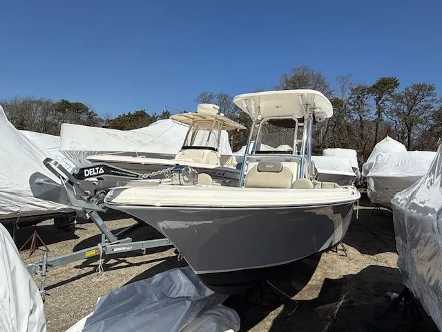 Slide: The Image of 2022 Key West 239 FS boat on a trailer outdoors. - 12