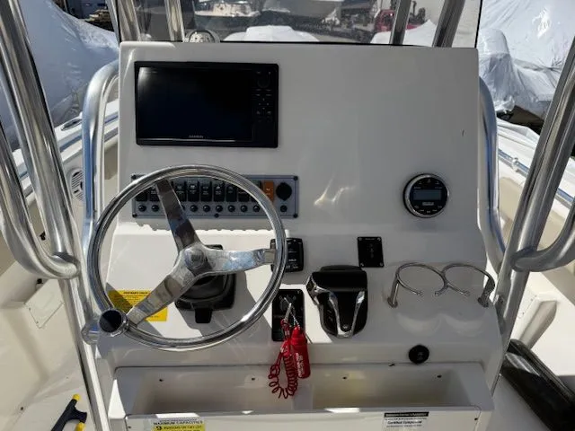 Slide: The Image of Key West 239 FS boat helm console, 2022 model. - 2