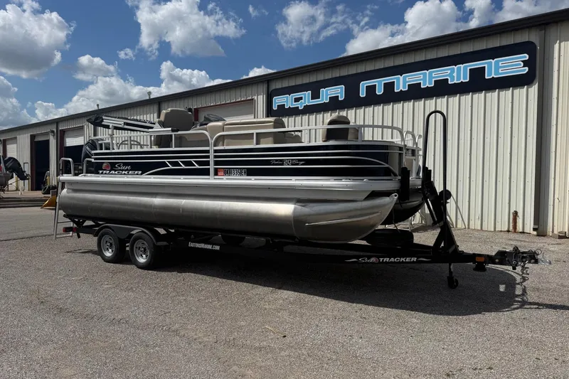 The Image of 2022 Sun Tracker Fishin' Barge 20 DLX pontoon boat at Aqua Marine dealership. - 0