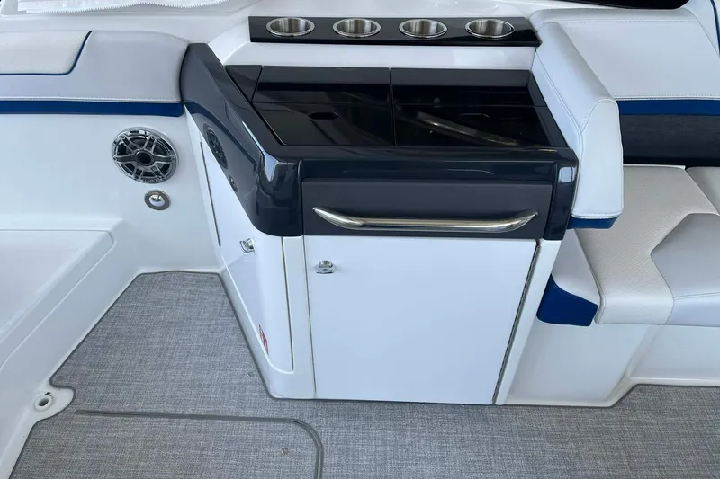 Slide: The Image of Interior of 2026 Formula 310 Bowrider I/O boat featuring sleek seating and modern amenities. - 19