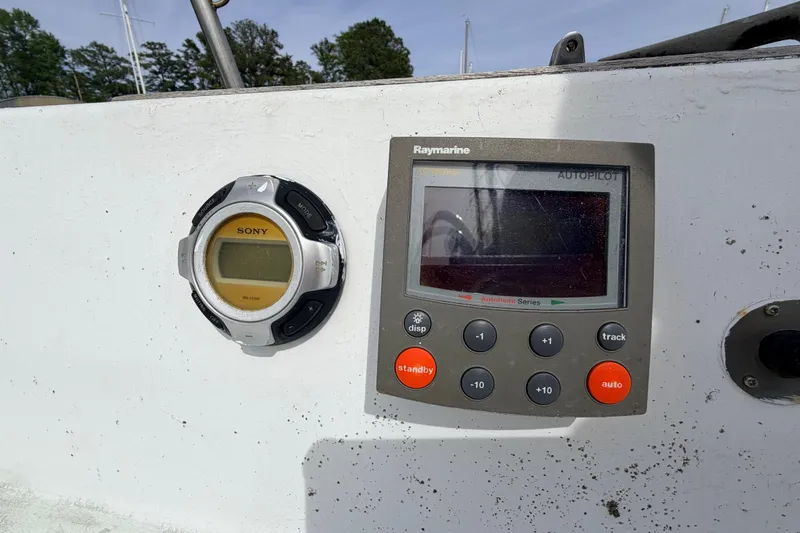 Slide: The Image of Control panel of a 1980 Hunter 37 Cherubini Cutter with Raymarine autopilot and Sony device. - 19