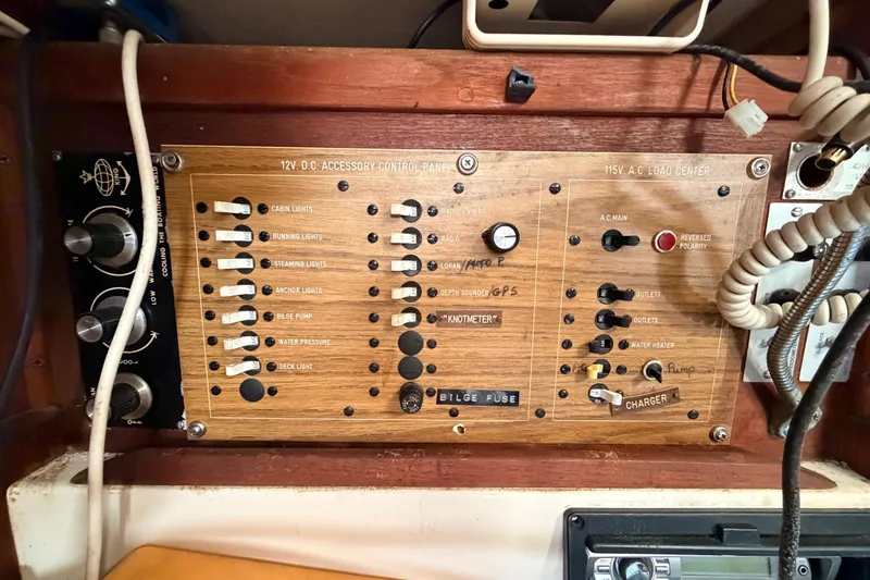 Slide: The Image of Electrical control panel on a 1980 Hunter 37 Cherubini Cutter sailboat. - 25