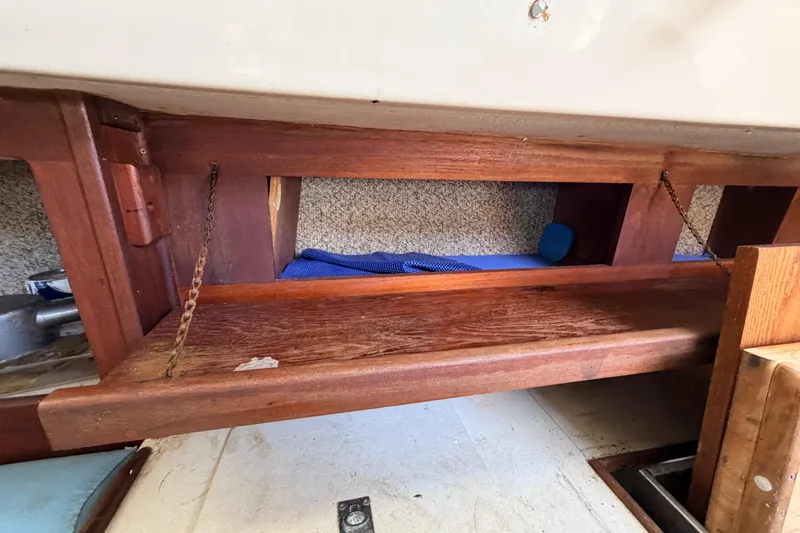 Slide: The Image of Interior view of 1980 Hunter 37 Cherubini Cutter with wooden shelving. - 29