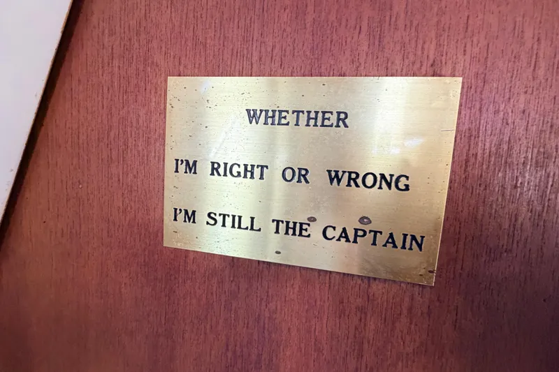 Slide: The Image of Plaque on 1980 Hunter 37 Cherubini Cutter: "Whether I'm right or wrong, I'm still the captain." - 37