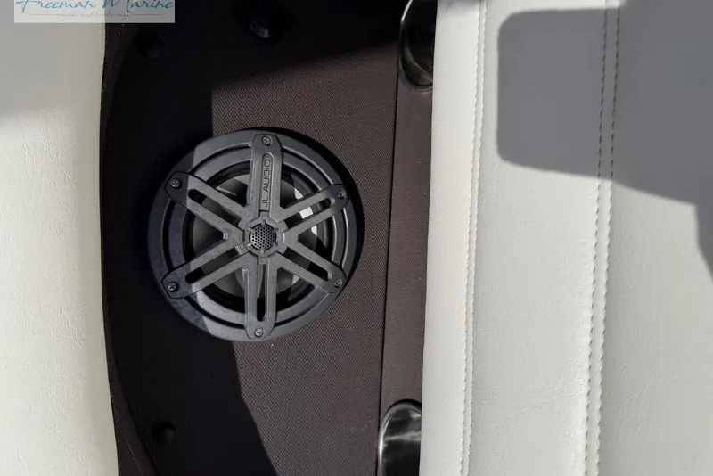 Slide: The Image of Boat speaker on a Marker One M25, 2016 model, with white upholstery. - 24