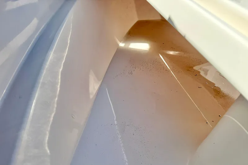 Slide: The Image of Interior view of 2024 Carolina Skiff 26 Ultra Elite boat compartment. - 17