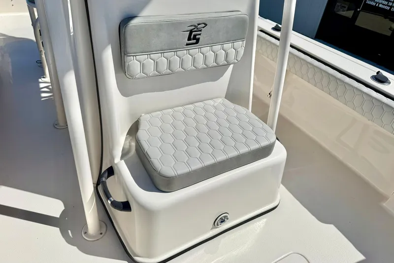 Slide: The Image of 2024 Carolina Skiff 26 Ultra Elite boat seat with hexagonal pattern upholstery. - 19