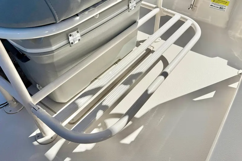 Slide: The Image of 2024 Carolina Skiff 26 Ultra Elite boat seating and storage area detail. - 24