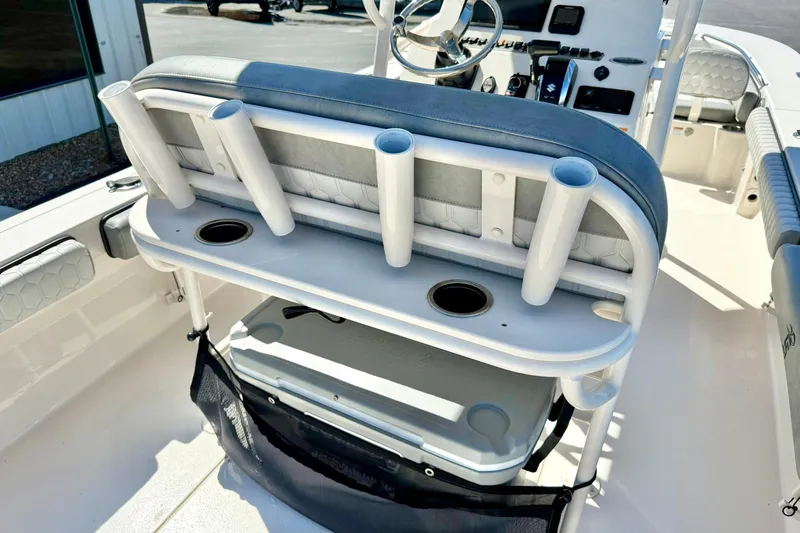 Slide: The Image of 2024 Carolina Skiff 26 Ultra Elite boat interior with rod holders and seating. - 25