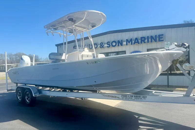 Slide: The Image of 2024 Carolina Skiff 26 Ultra Elite boat on trailer at marine dealership. - 4