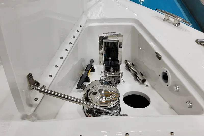 Slide: The Image of Anchor compartment of 2026 Formula 400 Super Sport Crossover boat, featuring a windlass system. - 10