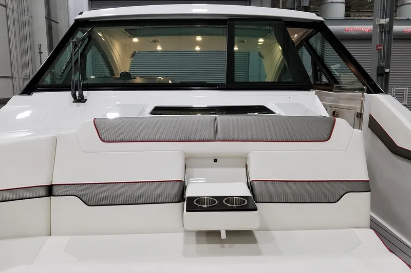 Slide: The Image of 2026 Formula 400 Super Sport Crossover boat interior with sleek seating and cup holders. - 11