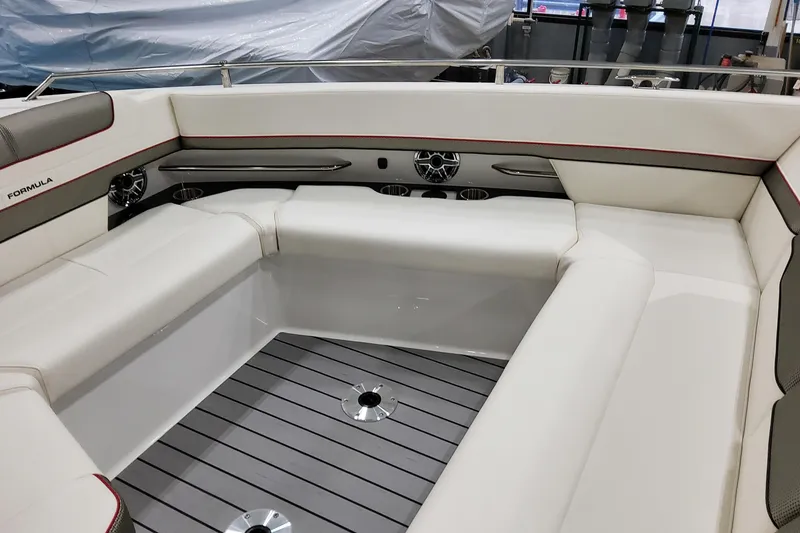 Slide: The Image of 2026 Formula 400 Super Sport Crossover boat interior with luxurious seating and modern design. - 12