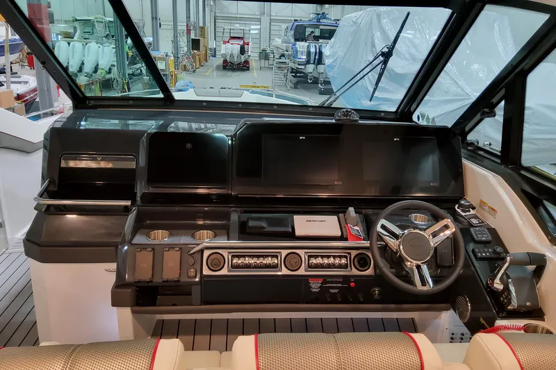 Slide: The Image of Helm of 2026 Formula 400 Super Sport Crossover with advanced controls and navigation displays. - 17