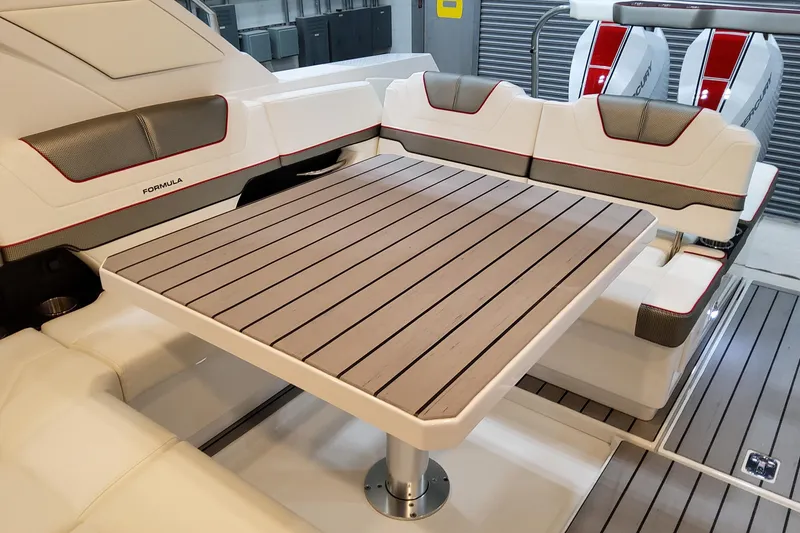 Slide: The Image of 2026 Formula 400 Super Sport Crossover interior with sleek seating and modern table design. - 21