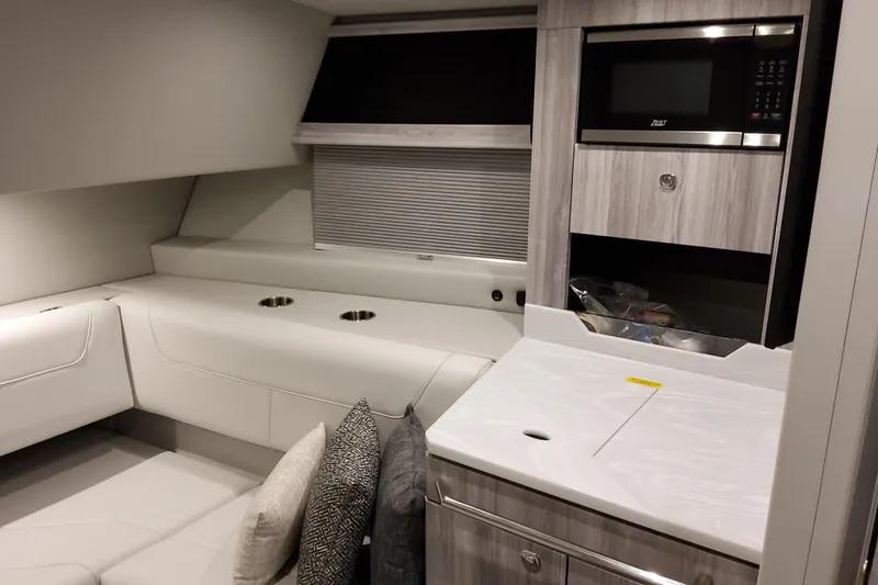 Slide: The Image of Luxurious interior of 2026 Formula 400 Super Sport Crossover with modern amenities and sleek design. - 24