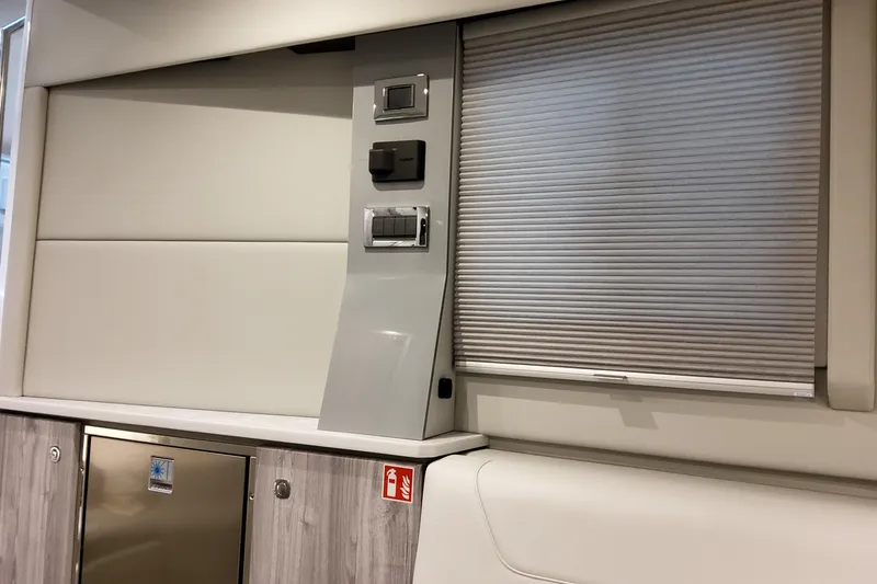 Slide: The Image of Interior of 2026 Formula 400 Super Sport Crossover with modern design and control panel. - 26