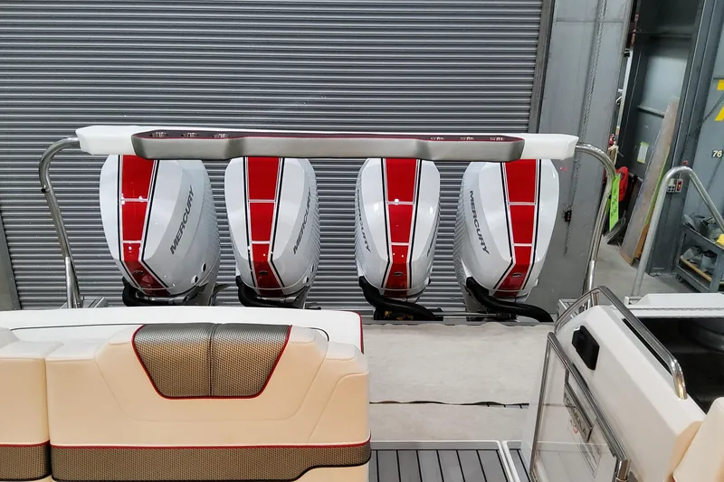 Slide: The Image of Four Mercury outboard engines on a 2026 Formula 400 Super Sport Crossover boat. - 8