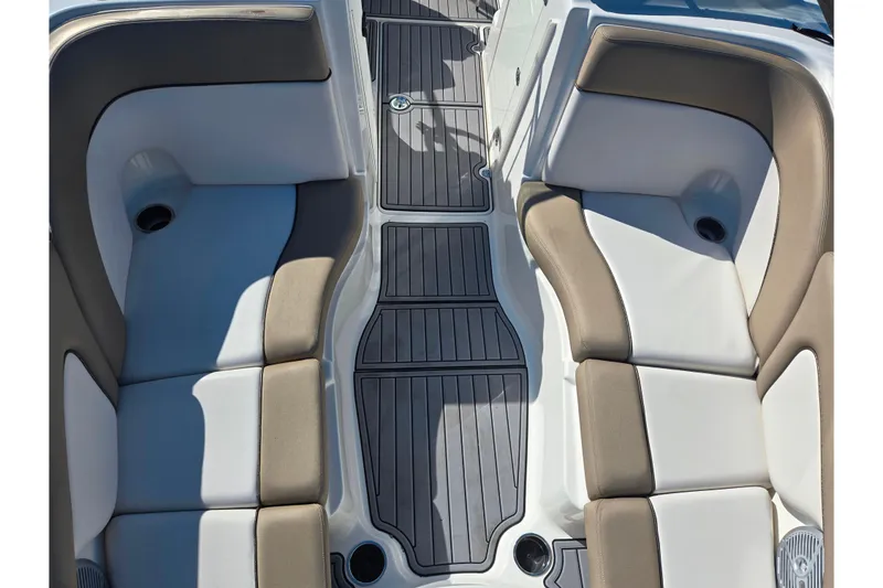 Slide: The Image of 2011 Yamaha Boats SX240 HO interior seating with gray and beige upholstery. - 19