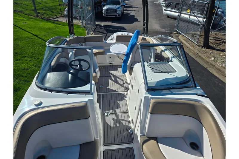 Slide: The Image of 2011 Yamaha Boats SX240 HO interior with seating and steering wheel. - 20