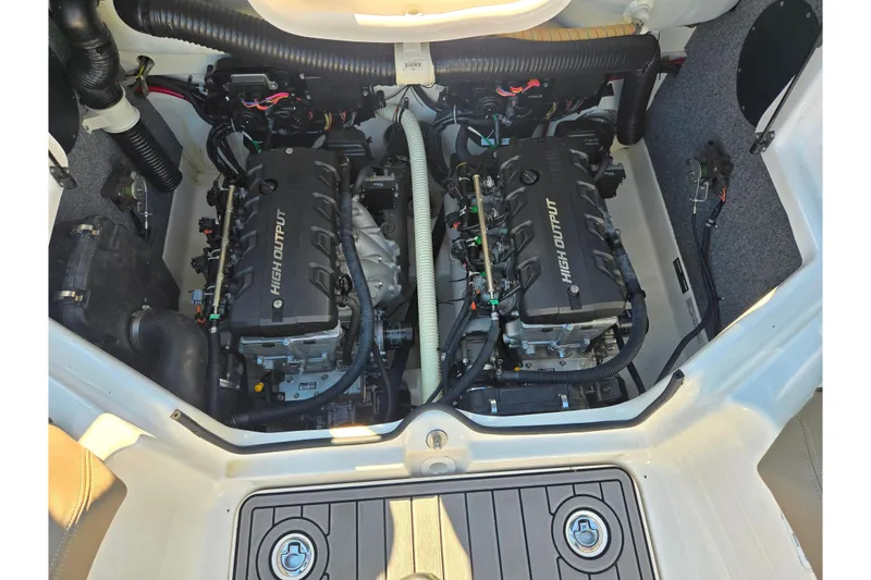 Slide: The Image of 2011 Yamaha Boats SX240 HO engine compartment with dual high output engines. - 23