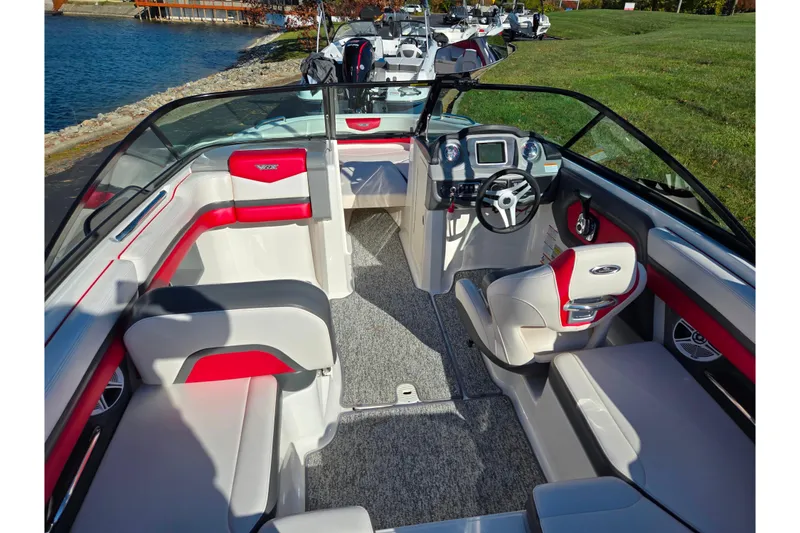 Slide: The Image of 2016 Chaparral Vortex 203 VRX boat interior with modern dashboard and seating. - 10