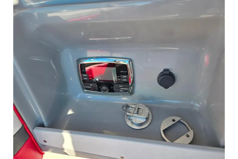 Slide: The Image of Control panel of a 2016 Chaparral Vortex 203 VRX boat with Bluetooth stereo system. - 15