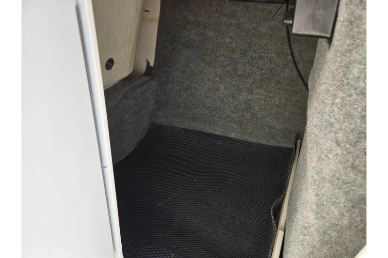 Slide: The Image of Interior storage compartment of 2016 Chaparral Vortex 203 VRX boat. - 17