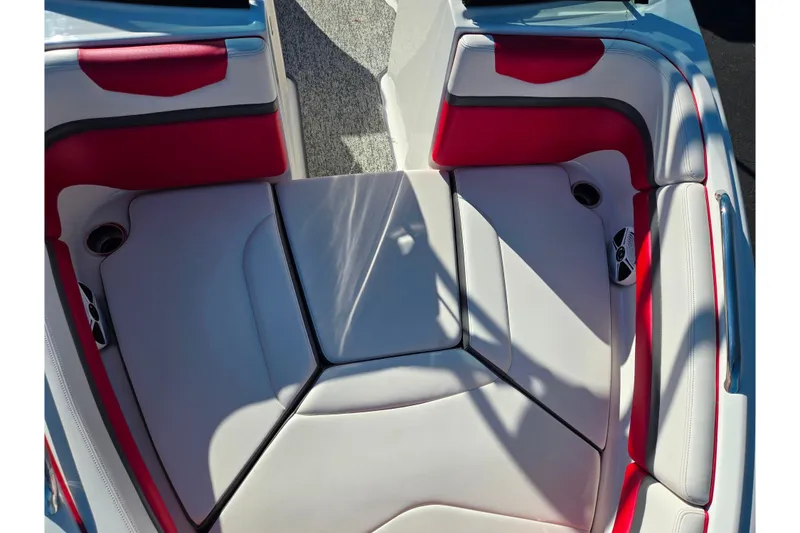 Slide: The Image of 2016 Chaparral Vortex 203 VRX boat interior with red and white seating. - 19