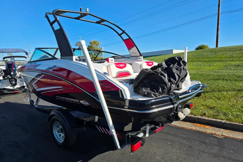 Slide: The Image of 2016 Chaparral Vortex 203 VRX boat on trailer, parked outdoors. - 3