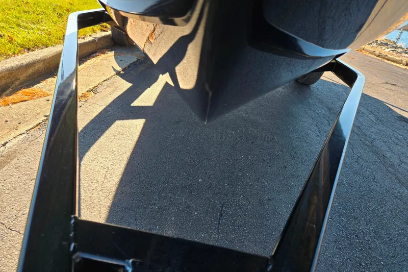 Slide: The Image of 2016 Chaparral Vortex 203 VRX boat on trailer, close-up view from below. - 7