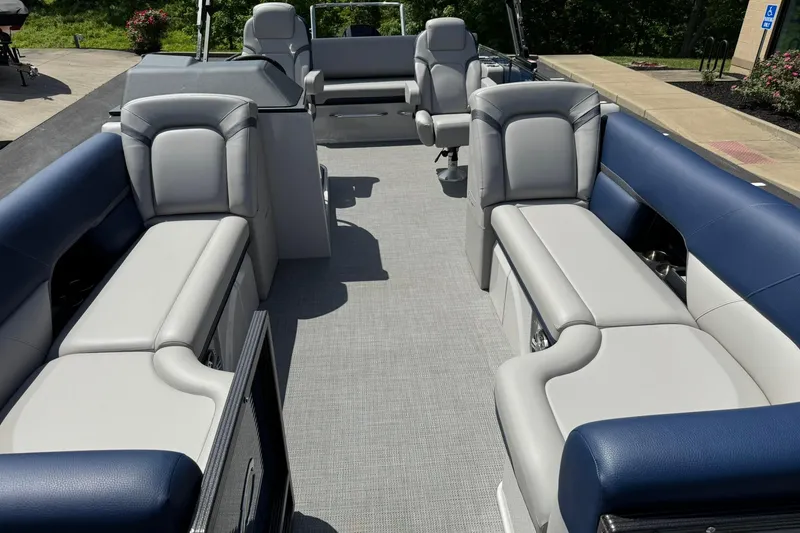 Slide: The Image of 2024 Crest Caribbean LX 230 boat interior with luxurious seating and modern design. - 7