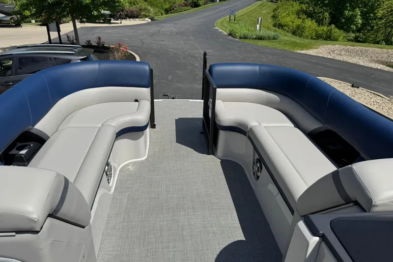 Slide: The Image of 2024 Crest Caribbean LX 230 boat interior with plush seating and modern design. - 8