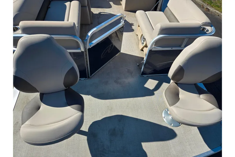 Slide: The Image of 2020 Avalon Venture Cruise Bow Fish boat interior with comfortable seating and open deck space. - 10