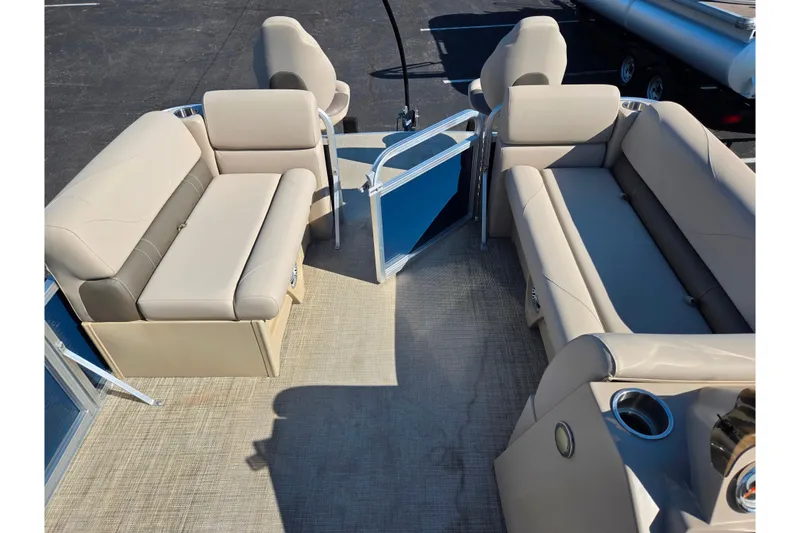 Slide: The Image of 2020 Avalon Venture Cruise Bow Fish 20' pontoon boat interior with beige seating. - 23